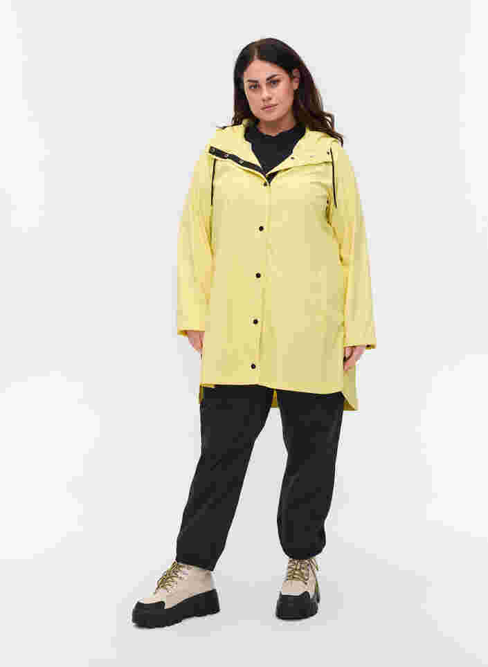 Regenjacke mit Kapuze und Taschen, Pale Banana, Model image number 2