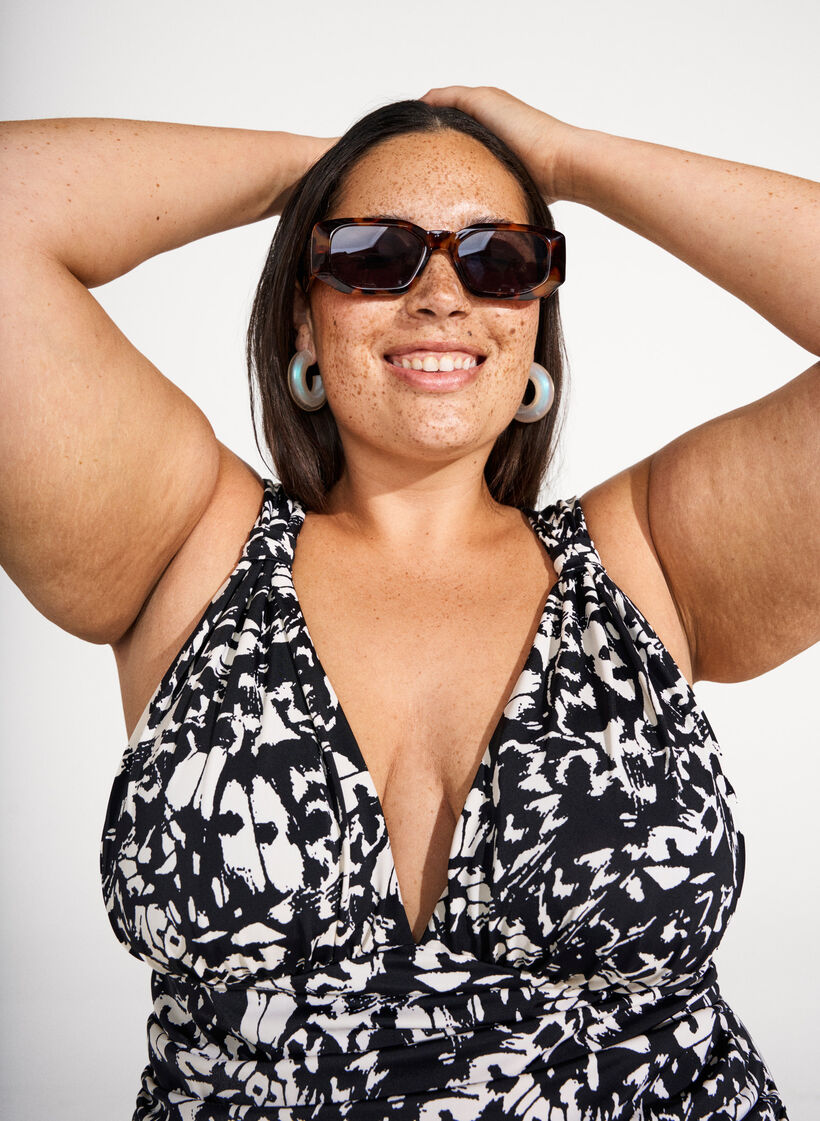 Gemusterter Badeanzug mit tiefem V-Ausschnitt, Schwarz, Image image number 0