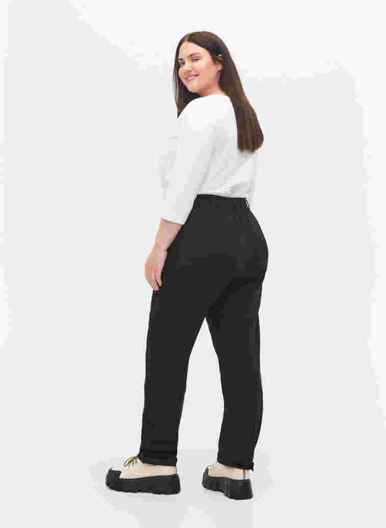 Hiking trousers with removable legs, Black, Model image number 1