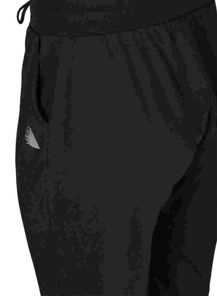 Lockere Trainingshose mit Taschen, Black, Packshot image number 3