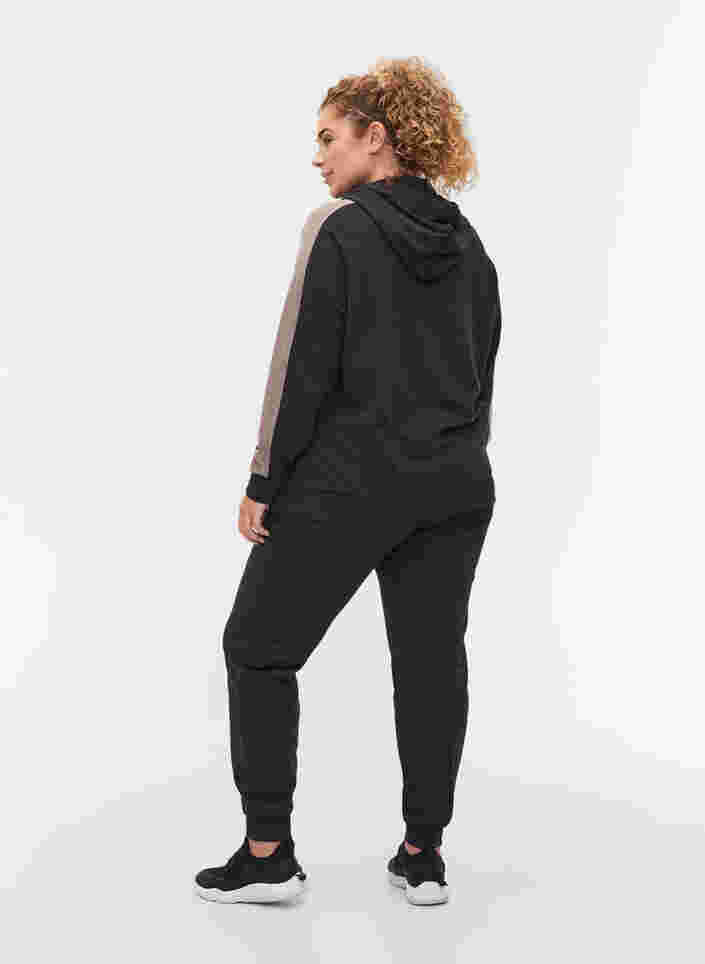 Lockere Sweatpants mit Taschen, Black, Model image number 1