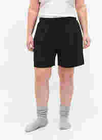 Lockere Shorts mit Struktur, Black, Model