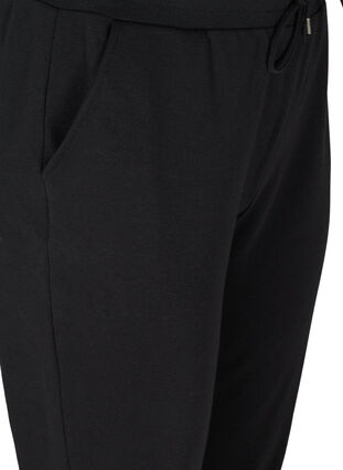 Lockere Sweatpants mit Taschen, Black, Packshot image number 2