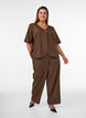 Bluse mit Glitzer und V-Ausschnitt, Braun, Model image number 1