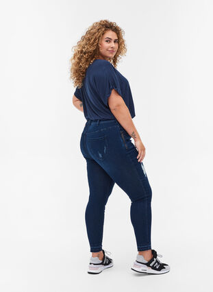 Super Slim Amy Jeans mit Schlitz, Dark blue denim, Model image number 1