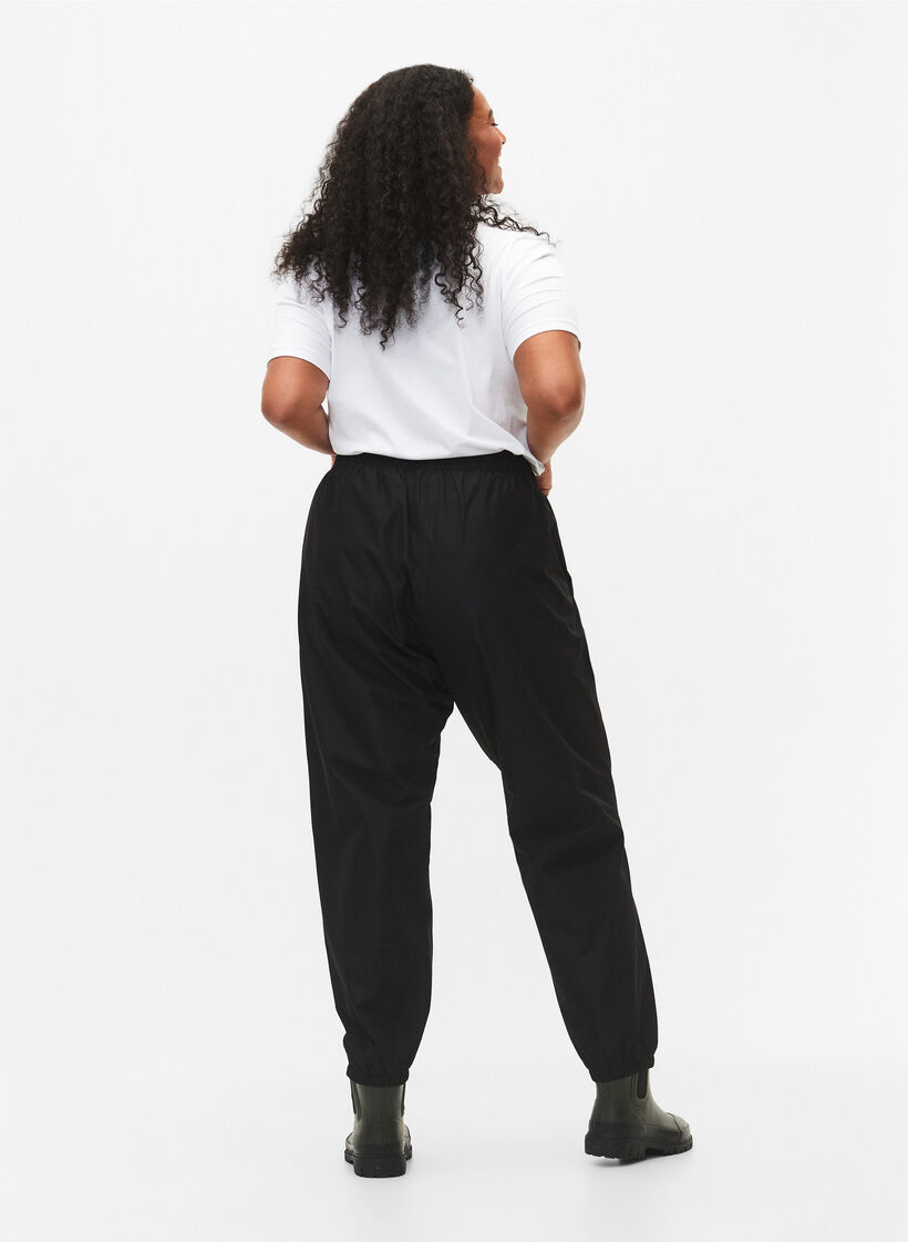 Regenhose mit Gummizug und Kordelzug, Schwarz, Model image number 1