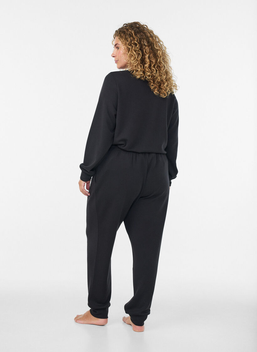 Jerseyhose mit hoher Taille und Taschen, Schwarz, Model image number 1