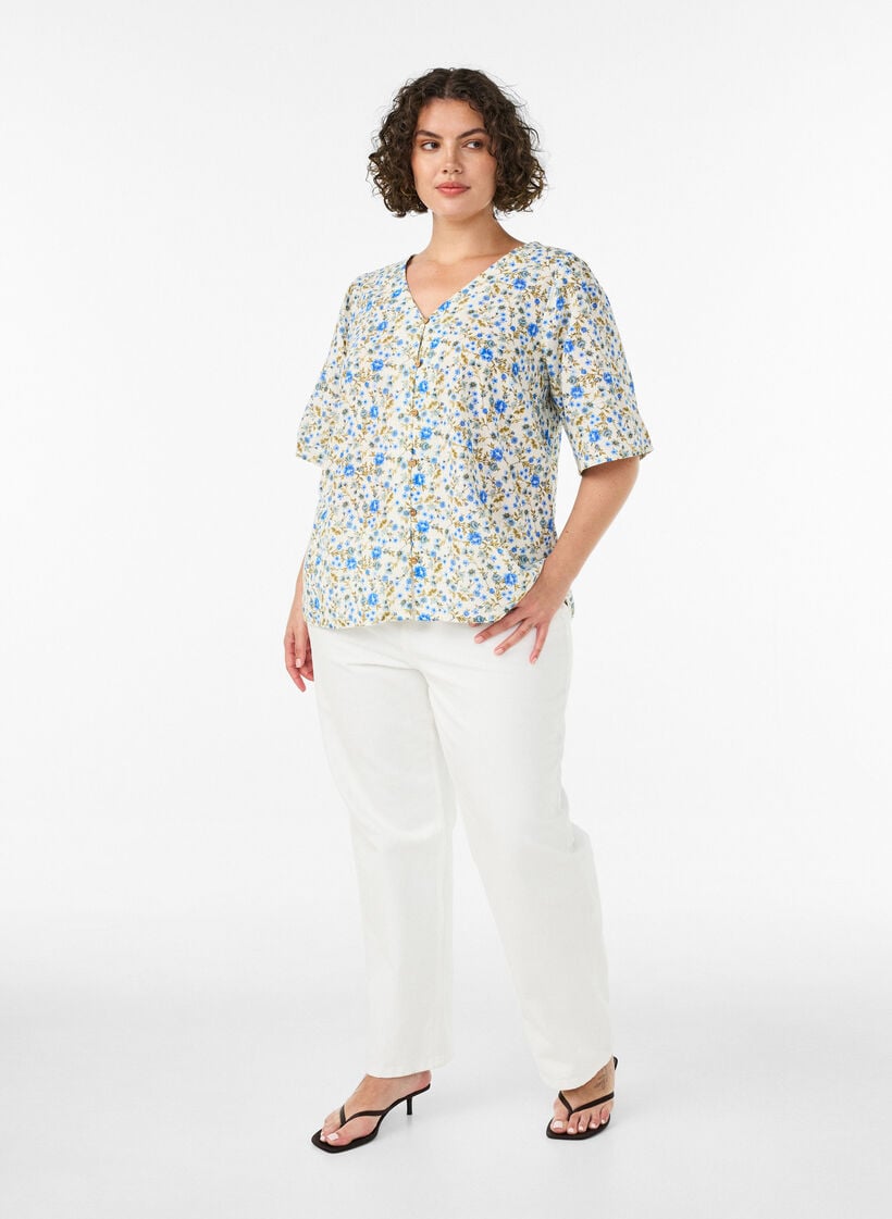 Kurz&auml;rmelige Bluse aus Baumwolle mit V-Ausschnitt, Blau, Model