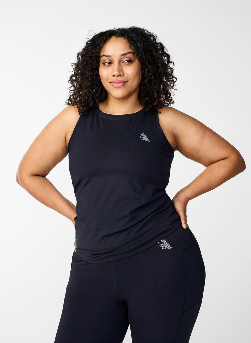 Enganliegendes Trainingstop mit Silikonrand innen, Black, Model image number 0