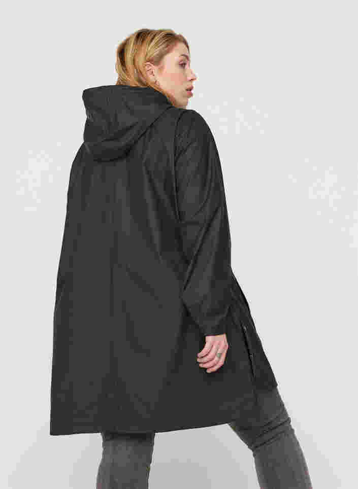 Regenjacke mit Kapuze und Taschen, Black, Model image number 1