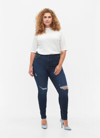 Super schlanke Amy Jeans mit Zerstörung und hoher Taille, Dark blue, Model