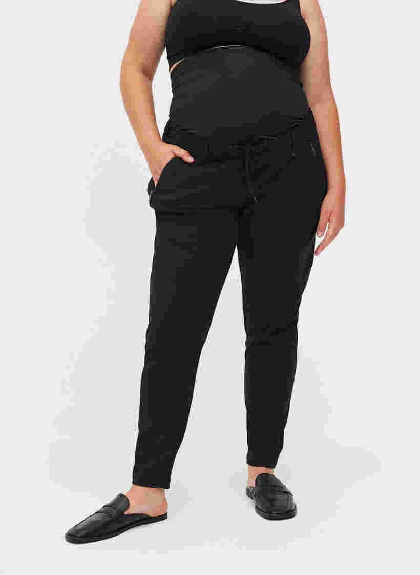 Schwangerschafts-Maddison-Hose mit Reißverschluss, Black, Model image number 2