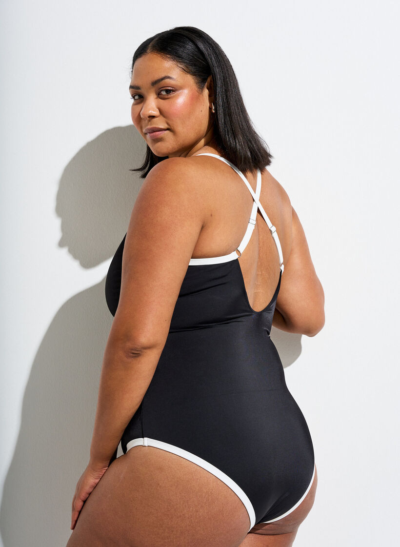 Sportbadeanzug mit kontrastfarbenen Paspeln und &uuml;berkreuzten Tr&auml;gern, Schwarz, Model image number 1