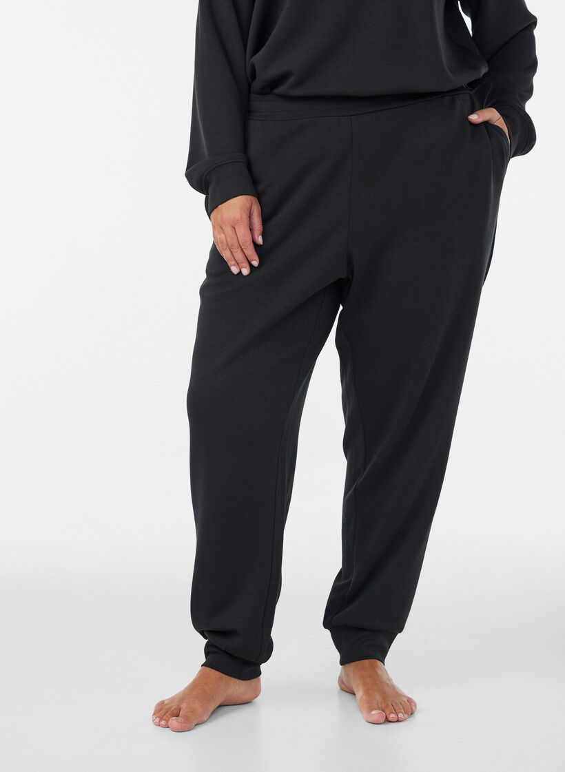 Jerseyhose mit hoher Taille und Taschen, Schwarz, Model image number 2