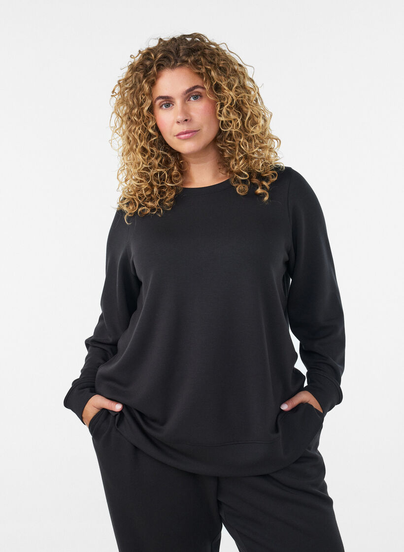 Lang&auml;rmelige Bluse aus Jersey mit Rundhalsausschnitt, Schwarz, Model image number 0