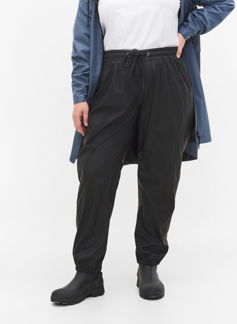 Regenhose mit Gummizug und Kordelzug, Black, Model image number 2
