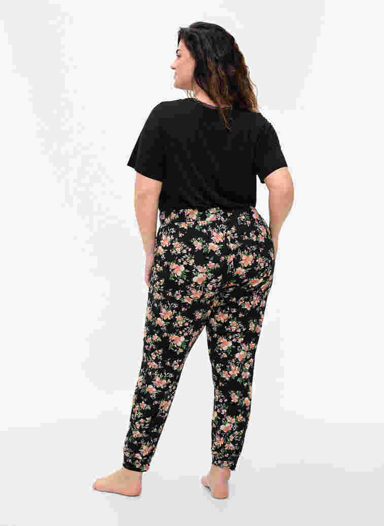 Schlafanzughose aus Baumwolle mit Blumenprint, Black Flower, Model image number 1